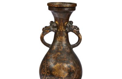 A parcel-gilt bronze baluster vase, Ming dynasty