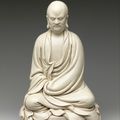 A superb and very rare Dehua figure of Damo seated in meditation, China, Ming dynasty, early 17th century 