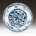 A Chinese porcelain charger, Ming dynasty, late 14th-early 15th century