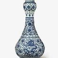 A large and finely painted blue and white 'dragon' garlic-mouth bottle vase, Wanli mark and period (1573-1619)