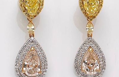 A pair of diamond and fancy colored diamond earrings