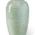 A celadon-glazed 'Buddhist emblem' vase, Qing dynasty, 18th-19th century