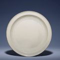 A rare moulded Ding dish, Yuan dynasty (1279-1368)
