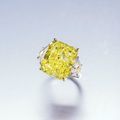 An 18.03 carat fancy yellow diamond and diamond ring, by Graff