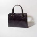 HERMES Paris. Sac Pullman en crocodile noir