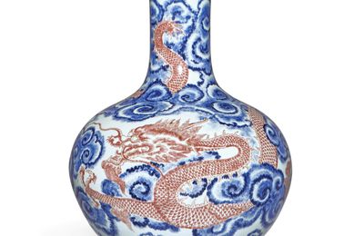 A magnificent and exceptionally rare underglaze-blue and copper-red 'dragon and cloud' vase (Tianqiuping), Seal mark and period of Qianlong