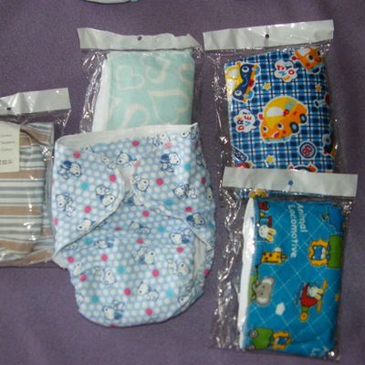 - couches lavables en flanelle neuves 4 à 10 kg