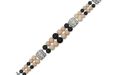 An art deco onyx, coral and diamond bracelet, by Boucheron