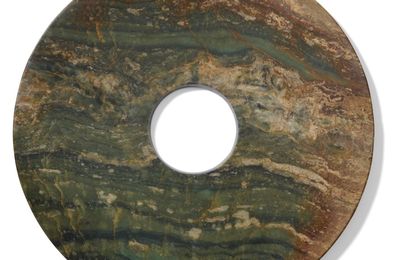 Two mottled jade discs, Bi, Neolithic period sold at Christie's Paris, 10 June 2025