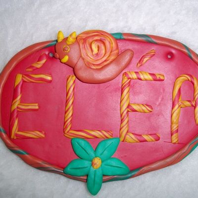 Une petite plaque de porte pour une petite puce