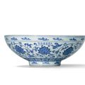 A rare blue and white ‘lotus’ dice bowl, Xuande six-character mark in underglaze blue in a line and of the period (1426-1435)