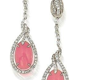 A fine pair of conch pearl and diamond earrings