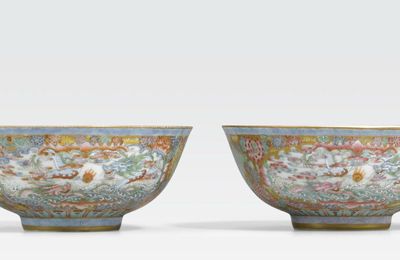 A pair of famille rose enameled and gilt painted dragon bowls, Qianlong marks, Republic period