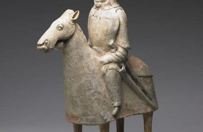 Painted pottery figure of a mounted man, Northern Qi dynasty, 550-577 CE