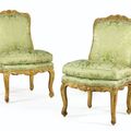 Paire de chaises en bois sculpté et redoré du début de l'époque Louis XV