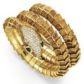 A wood, diamond and emerald snake bracelet   