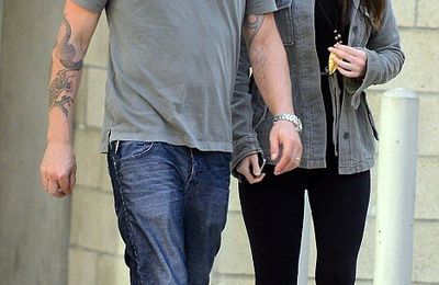 Baggy is best for Megan Fox who covers her tummy in casual clothes amid growing pregnancy rumours