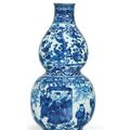 A rare late Ming blue and white double-gourd wall-vase, Wanli six-character mark in underglaze blue and of the period