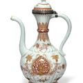 A rare iron-red and gilt ewer and hinged cover, Kangxi period (1662-1722)