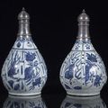 A pair of blue and white 'flying horses' bottle vases with ottoman silver mounts, China, the porcelain Wanli period 