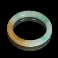 A carved jadeite bangle