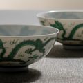 A pair of green Dragon porcelain bowls, iron-red Daoguang seal marks and period (1921-1850)