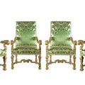 Très rare et importante suite de quatre fauteuils d'apparat en bois de hêtre et de noyer doré. Époque Louis XIV