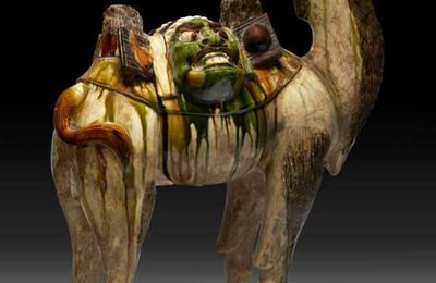 A rare and massive sancai-glazed pottery figure of a Bactrian camel, Tang dynasty (AD 618-907)