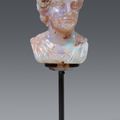 A rare miniature carved opal bust of a Roman emperor, Presumably Italian, 17th century