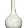 A white-glazed incised 'Dragon' bottle vase, Qing dynasty, 18th century