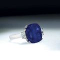 An important 14.55 carats Kashmir cushion-shaped sapphire and diamond ring