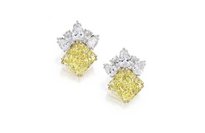 Magnificent pair of platinum, 18 karat gold, fancy vivid yellow diamond and diamond pendants, Molina