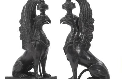 A pair of Wedgwood black basalt griffin candlesticks. Late 18th/early19th century