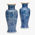 A pair of Chinese blue and white porcelain 'phoenix' baluster vases, Kangxi period 