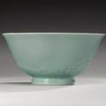 A rare large carved celadon-glazed bowl. Yongzheng Mark And Period.