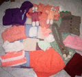 21 pieces realisees par mon groupe tricot au mois