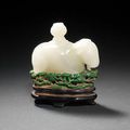 A fine and rare Mughal-style white jade goat-shaped water dropper and stopper. Late 18th/early 19th century