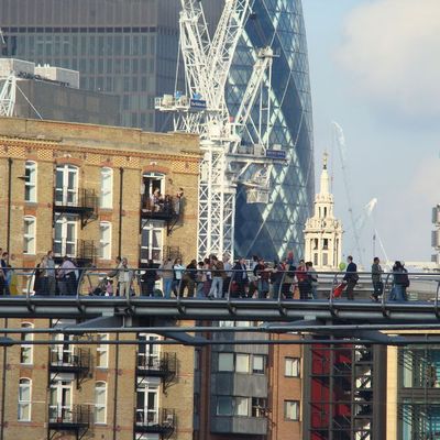 PEOPLE WALK ON FOSTER 