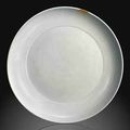 A very rare large anhua-decorated white-glazed dish. Yongle period (1403-1425)