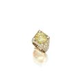 Fancy intense yellow diamond and diamond ring