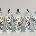 Polychrome chinoiserie garniture of five vases and covers. Delft, circa 1760-75