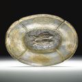 A rare parcel-gilt silver lobed oval bowl. Tang dynasty (618-907) 