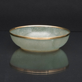 A fine jade bowl with gold rim. Four character Qianlong mark. China, Qing dynasty (1644-1911)