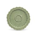 A carved and moulded Longquan celadon barbed-rim cup stand, Hongwu period (1368-1398)