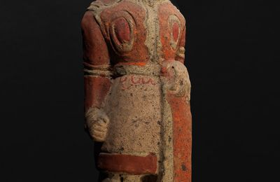 A painted pottery figure of a guardian, Wei Dynasty (386-550 AD)