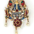 A Renaissance gold, garnet and enamel devotional pendant of 'The Virgin of the Pillar'