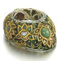 A Mughal gem-set and enamelled gold archer's ring, North India, circa 18th-19th century