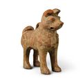 A green-glazed pottery figure of a dog, Han dynasty (206 BC-220 AD)