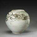 An underglaze iron-decorated globular jar and a white glazed porcelain jar. Joseon Dynasty, 19th Century