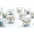 An extremely rare set of twelve wucai  'month' cups. Markd and period of Kangxi